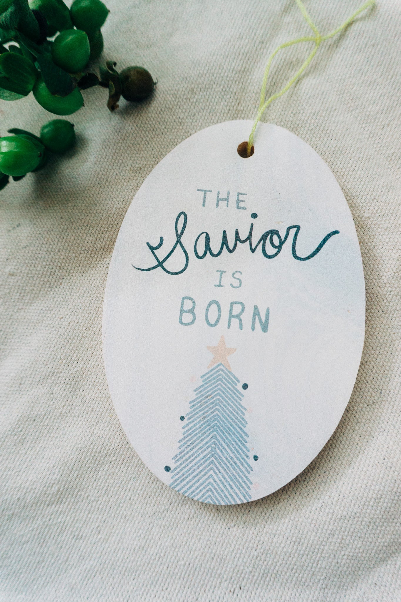 The Savior is Born - Wooden Oval Ornament